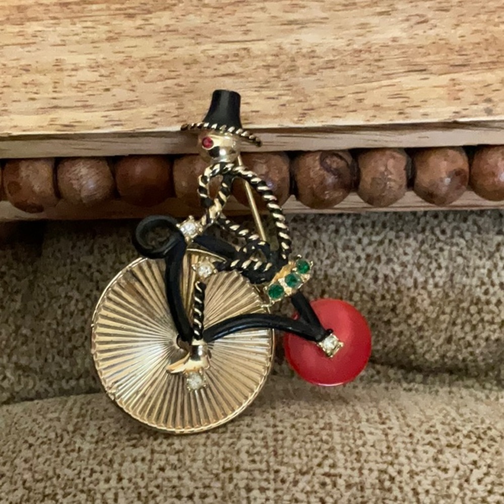 Vintage Mid Century Brooch braided man on Tricycle with colored Rhinestones